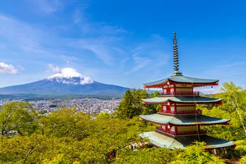 Wide angle shot of snow-capped Mt. Fuji with Chureito Pagoda at Arakurayama Sengen Park, Fujiyoshida, Japan, in the Spring. © ronniechua