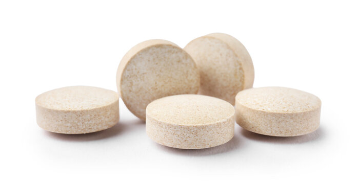 Pile of many pills isolated on white