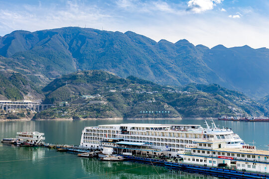 CHINA, HUBEI PROVINCE, MARCH, 08, 2026: Cruise ships stop on the Yangtze River near the Three Gorges Dam in China. Yangtze River cruises are a popular tourist destination.