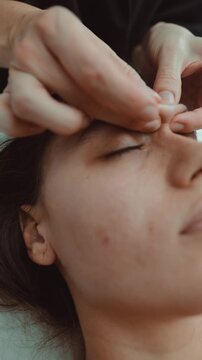 Serene massage session relieves stress with delicate acupoint stimulation