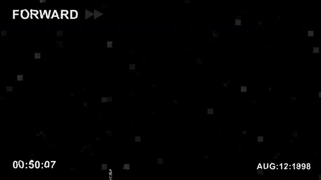 VHS fast forward screen with digital static noise and date timestamp from 1998 a retro vintage old school video player glitch effect background