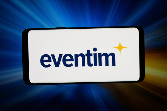 Stuttgart, Germany - 05-08-2026: In this photo illustration, the logo of ticketing company CTS Eventim AG Co. KGaA is displayed on a smartphone in front of abstract background on computer screen.