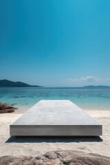 Fototapeta premium Concrete platform stretches toward turquoise sea