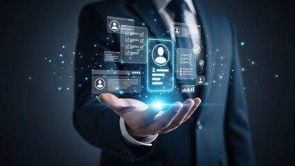 Obraz premium Business professional holding a digital interface with technology icons and communication symbols