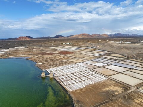 Salt mining plant, Salinas de Janubio with green Laguna de Janubio, near Yaiza, aerial view, Lanzarote, Canary Islands, Spain