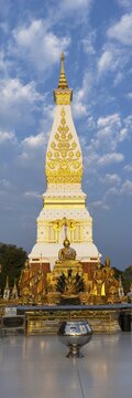 Chedi decorated with golden ornaments at Wat Phra That Phanom at sunrise, temple complex in Amphoe That Phanom, Nakhon Phanom Province, Isan, Thailand
