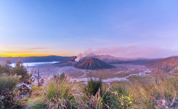 Sunrise, smoking Mount Bromo, Mt. Batok at front, Mt. Kursi at back, Mt. Gunung Semeru, Bromo Tengger Semeru National Park, Java, Indonesia