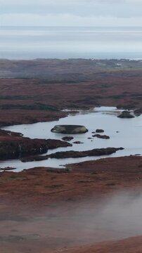 Aerial of the historic Ringfort at Lough Doon, Portnoo, County Donegal, Ireland