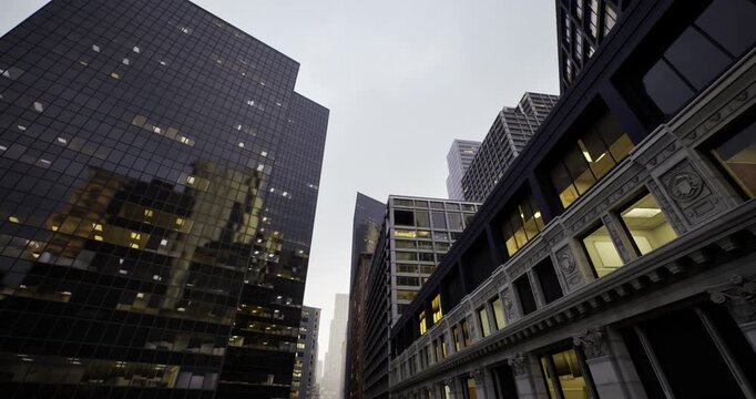 late shift office lights illuminating glass towers, mirrored facades capturing urban glow, sense of productivity and nighttime momentum, corporate night shift