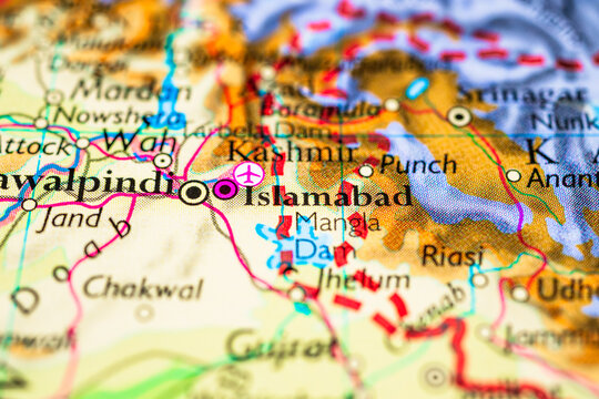 Detailed atlas map featuring Islamabad and Rawalpindi with surrounding Kashmir region and transport connections.