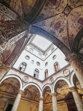 Scouting Ancient Florence Palace Interior Showcasing Fresco Ceilings And Artistic Columns For Feature Article