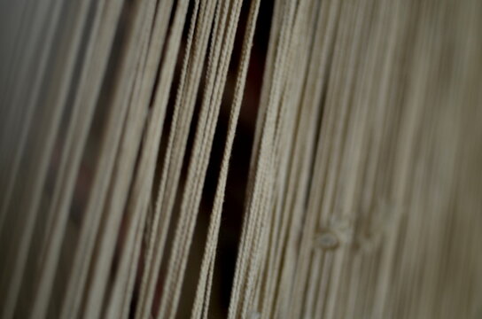 Close up of natural woven threads with soft blur