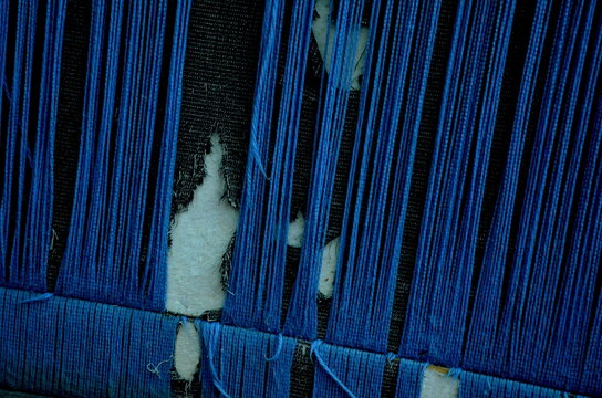 Close up of blue woven threads and textile texture