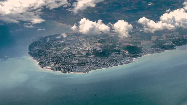 4k aerial video footage, flying along landscape in Kent, a ceremonial county in South East England with coastline, city of Margate and Westgate-on-Sea in front and Dover ferry port and English Channel