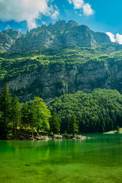 Majestic Alpine Lake and Mountains on a Vibrant Summer Day