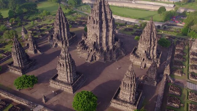 Aerial Drone Flight Over Ancient Prambanan Hindu Temple Complex in Yogyakarta, Indonesia at Sunrise