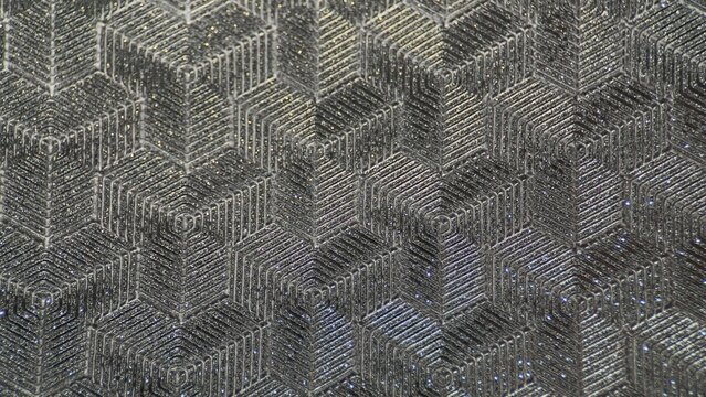 Futuristic geometric metallic texture with hexagonal pattern
