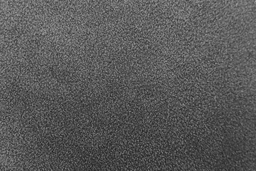 Fototapeta premium Dark gray synthetic leather texture background with fine grain detail.