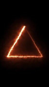 Abstract fire triangle glowing with orange light on black surface.