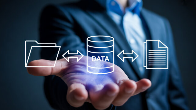 Businessman presenting data transfer concept with hand outstretched in blue suit