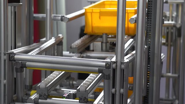 Warehouse, storage facility, automated storage system, conveyor belt.