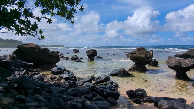 Scenic coastal view rock formations on the Lavena Coastal Walk, Bouma National Heritage Park, tropical island Taveuni, Fiji