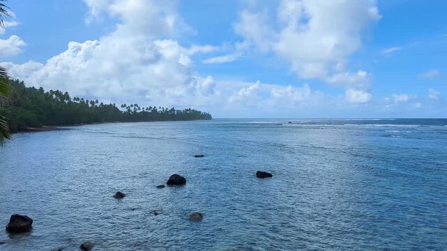 Scenic pan of the Lavena Coastal Walk within Bouma National Heritage Park with Fijian ocean view in Taveuni, Fiji