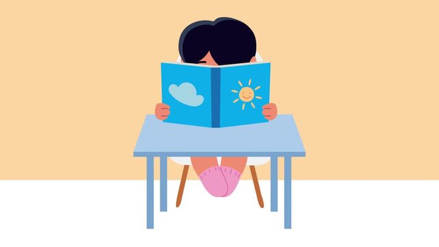 Young child sitting at desk and reading a colorful book with sun and cloud illustration.