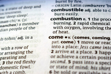 Fototapeta premium Detail Of English Dictionary Page And Word Pronunciation Of - come