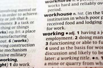 Fototapeta premium Close Up Of English Explanation Dictionary Page Word Of - working