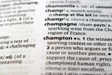 Fototapeta premium Definition Of English Dictionary Close Up Of Page With Word - champion
