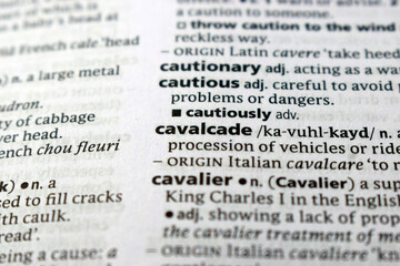 Fototapeta premium Detail Of English Dictionary Page And Word Pronunciation Of - cavalcade