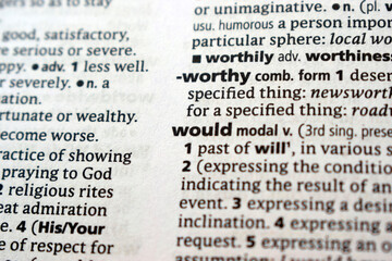 Fototapeta premium Close Up English Dictionary Page With The Word Translation Of - would