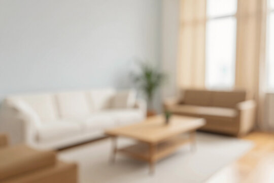 Softly lit living room feels calm and inviting. Minimalist furniture blends warmth with clean lines. Blurred.