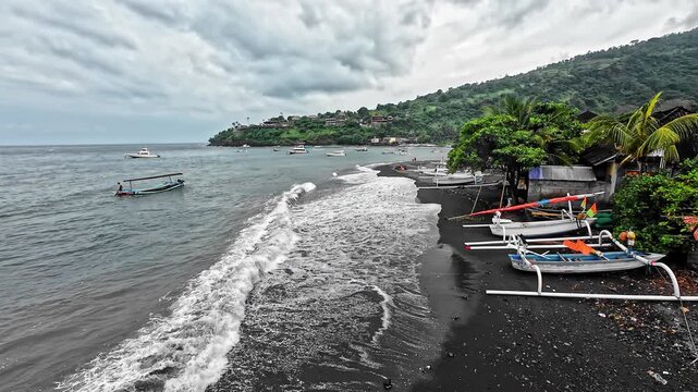 Outrigger Wooden Boats At The Fishing Village Of Amed In Bali, Indonesia. Slow Motion Shot