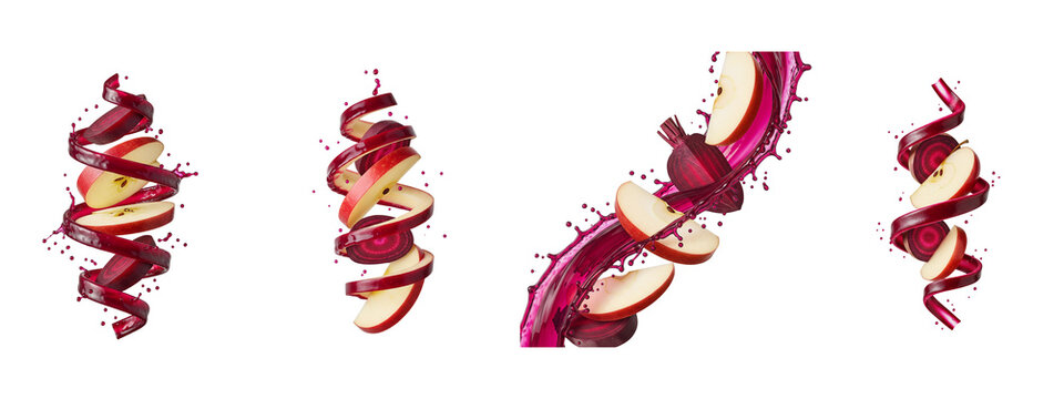 Apple and beetroot slices with flying juice splashes on black background