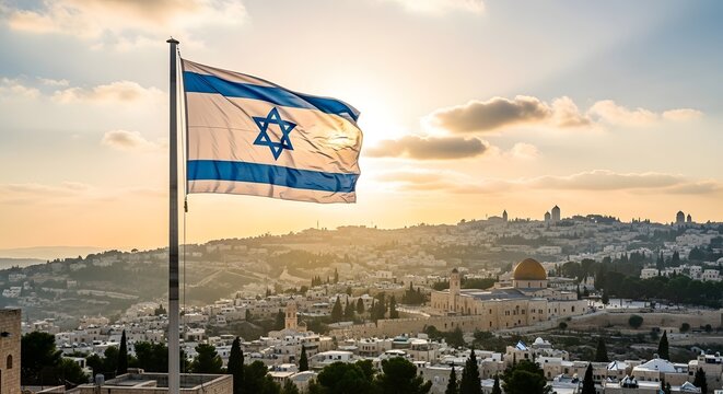 Flag of israel waving over the historic skyline of jerusalem at sunset
