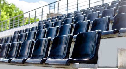 Fototapeta premium Plastic seat spectator stands for the stadium 