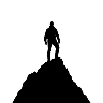 Silhouette of a person standing triumphantly on a mountain peak, symbolizing achievement and overcoming challenges.