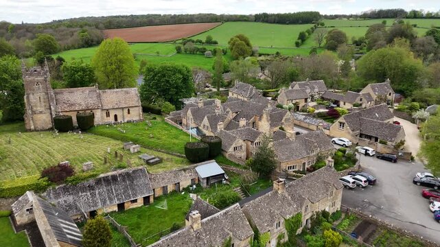 Scenic Aerial View of Upper Slaughter Village and the River Eye in Cotswolds, England
