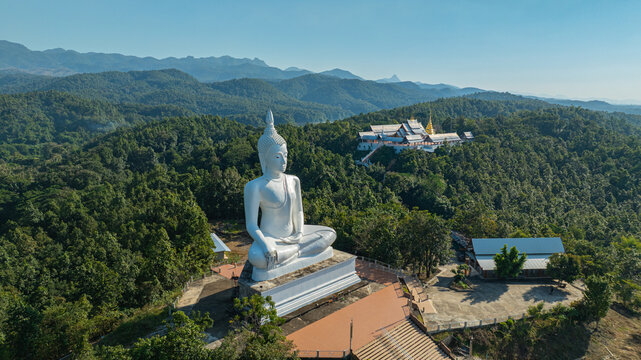 Located in the mountains of Phrae Province, Wat Phra That Pu Jae is an ancient Buddhist temple known for its square stupa containing a sacred relic of the Buddha. This peaceful 