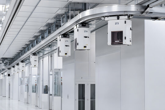 Overhead wafer transport in pristine semiconductor clean room