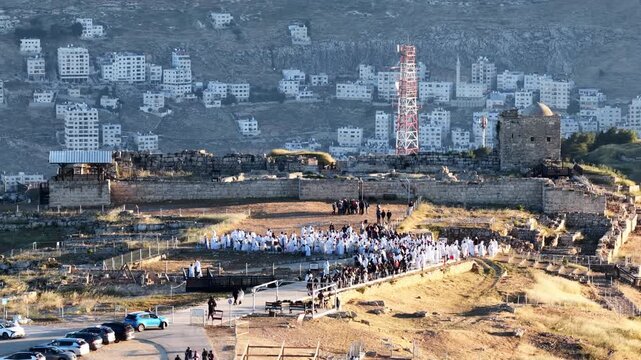 Aerial Samaritan Passover Ceremony During Sunrise Mount Gerizim

Drone footage capturing Samaritan Passover ceremony during sunrise on Mount Gerizim, 06 May 2026, Israel.

