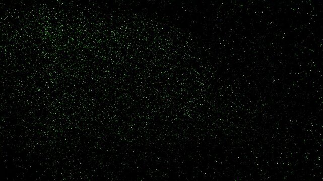 Green particle cloud on black background dots scatter pattern art abstract