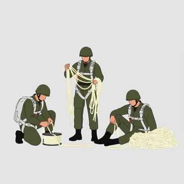 Soldiers preparing parachutes for military operation