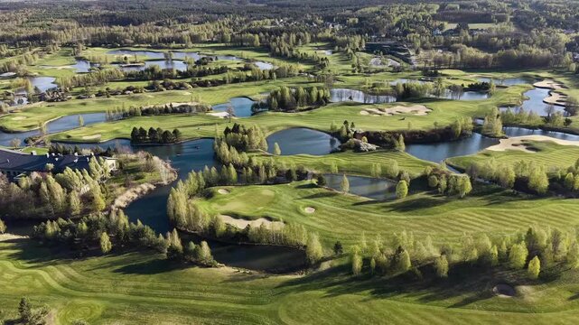 Nature rich golf course with trees and calm water