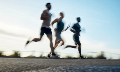 Fototapeta premium Running, fitness and motion blur with friends outdoor for workout partner, health and exercise club. Wellness. training team and runner with people in nature for sports, support and competition