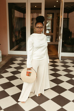Young elegant black woman at a formal event