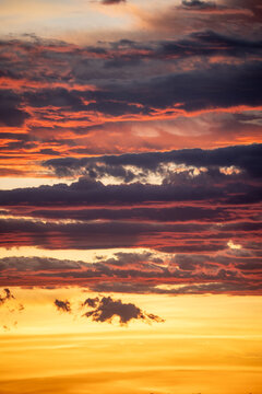 Dramatic Sunset Clouds Over Horizon