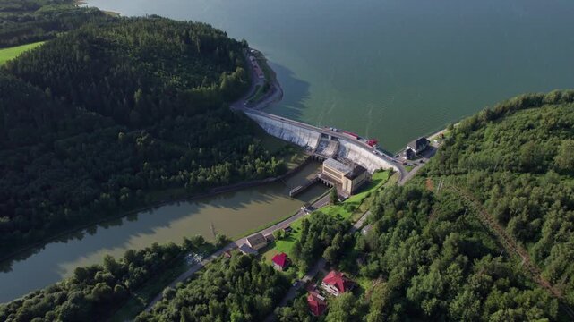 Aerial view of hydroelectric power plant and dam in mountainous landscape Orava region, Slovakia